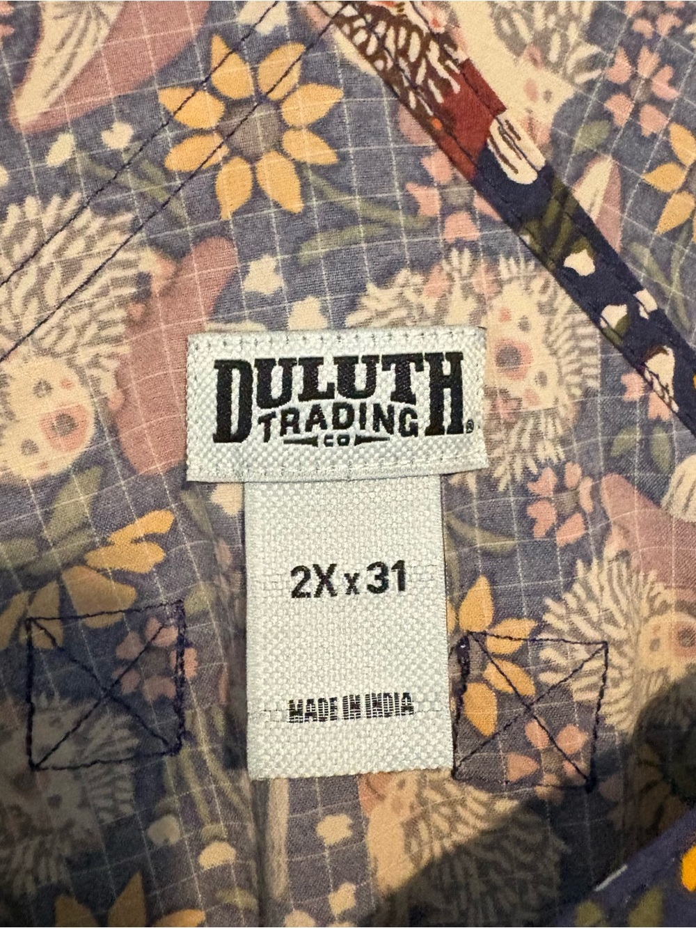 Duluth Heirloom gardening bib overalls in dusk blue with hedgehogs and mushrooms - Picture 4 of 7
